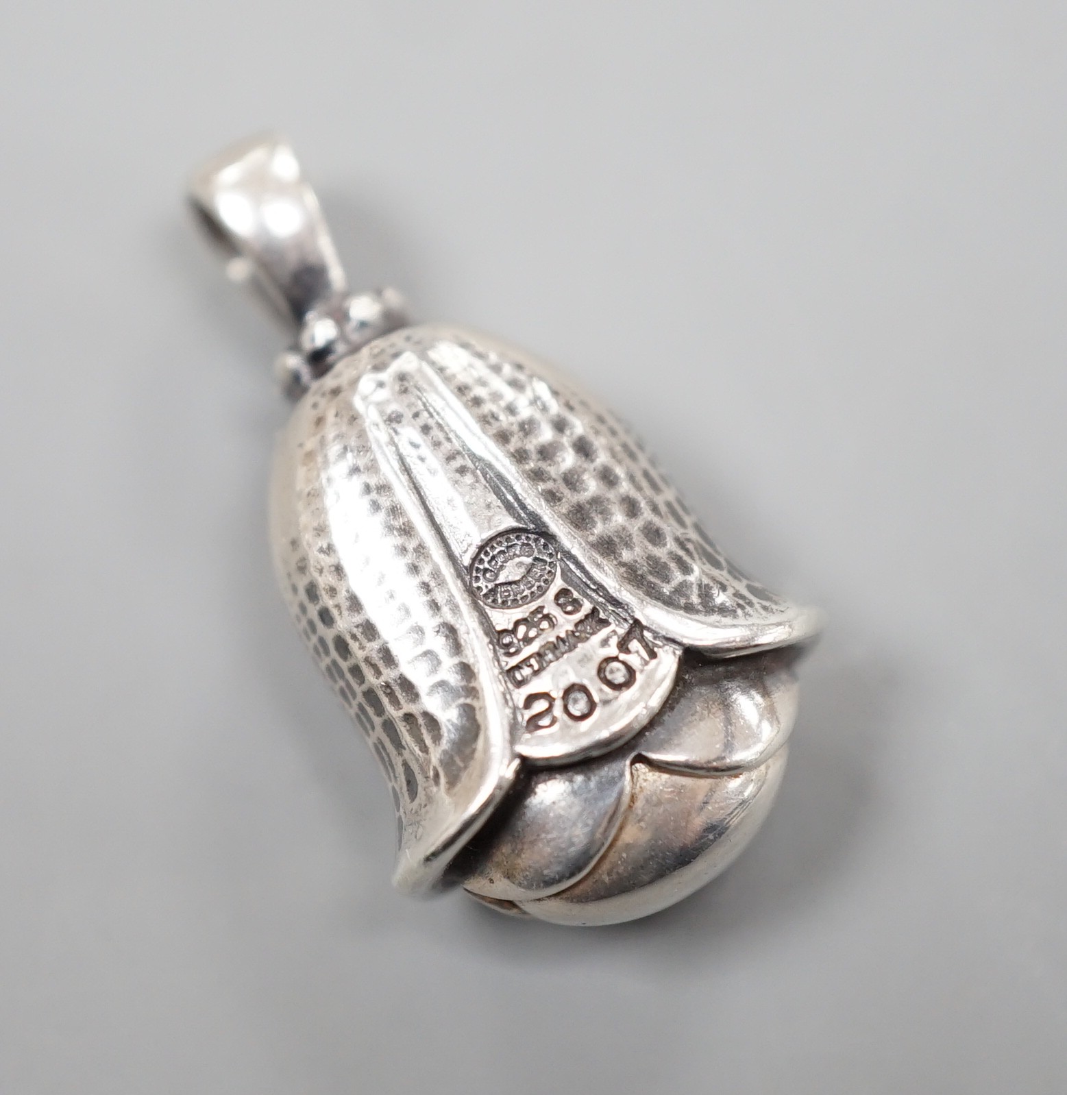 A Georg Jensen sterling artist pendant for the year 2007, of tulip form, 26mm.